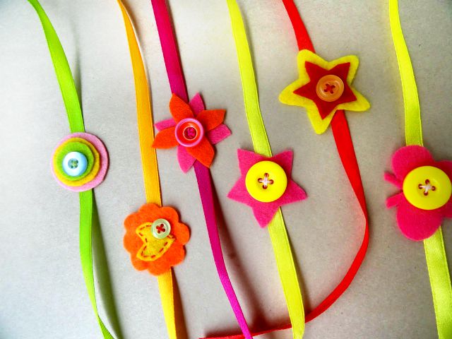 Cute Handmade Rakhis with buttons - We have 15 best ideas to make Rakhi at home for Rakshabandhan - Perfect rakhi ideas for kids to make, rakhi competition, best of waste, simple and handmade with detailed step by step images- ArtsyCraftsyMom