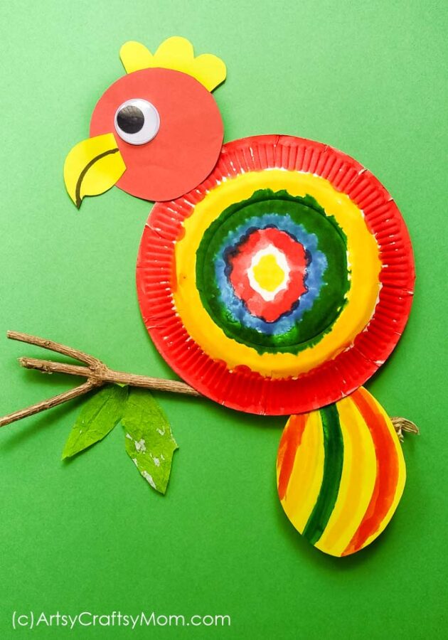 This Paper Plate Parrot Craft is the perfect project for a rainforest or bird unit at home or at school for Preschoolers. Watch their happy faces as they transform a plate into a colorful bird.