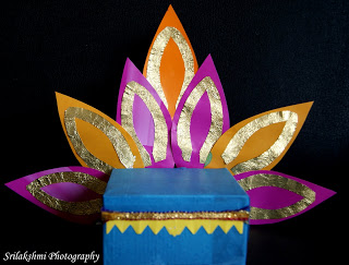 Ganesha-Seat-craft - via ArtsyCraftsyMom.com - Ganesh Chaturthi Crafts and Activities to do with Kids - Make a Clay Ganesha, decorate, Ganesha's throne & umbrella, rangoli ideas, recipes, books and more