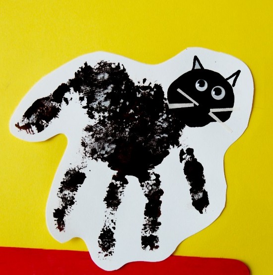 handprint black-cat - October 29th is National Cat day - Sharing our favorite 21 Cat - themed craft activities & books. Free Printable, Art and craft activities and loads of books