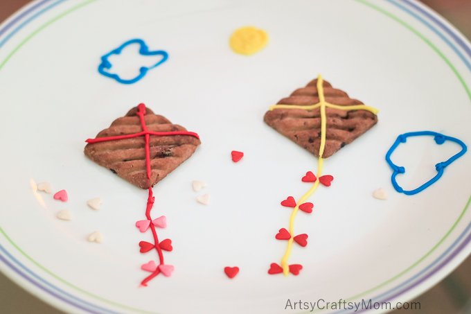 Turn an ordinary biscuit into Edible Kite cookies that are perfect for Sankranti, the Indian Harvest Kite Festival. Simple, clever fun dessert for kids.
