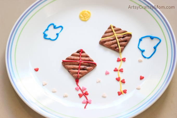 Turn an ordinary biscuit into Edible Kite cookies that are perfect for Sankranti, the Indian Harvest Kite Festival. Simple, clever fun dessert for kids.