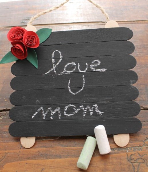 Have fun with these Mother's Day Crafts to Make with Craft Sticks! Make a Popsicle stick photo frame, an earring holder, a coaster, or even a holder for Mom's beloved recipes!