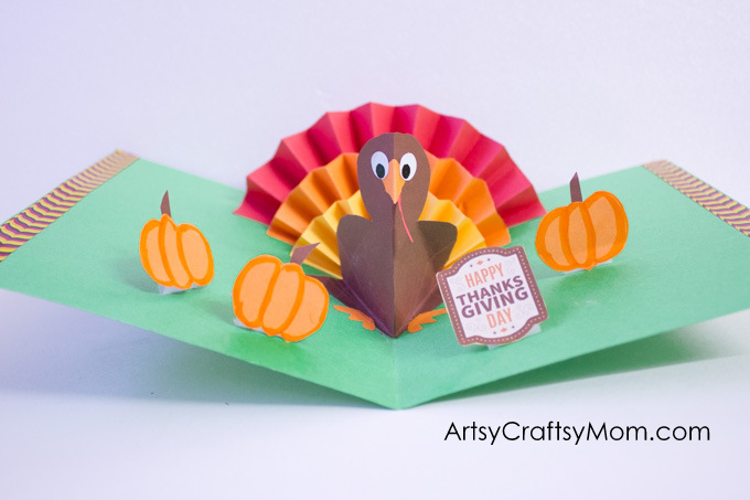 DIY Thanksgiving Turkey Popup Card - Here's an easy accordion fold turkey craft that pops right up to wish kids a Happy Thanksgiving Day!