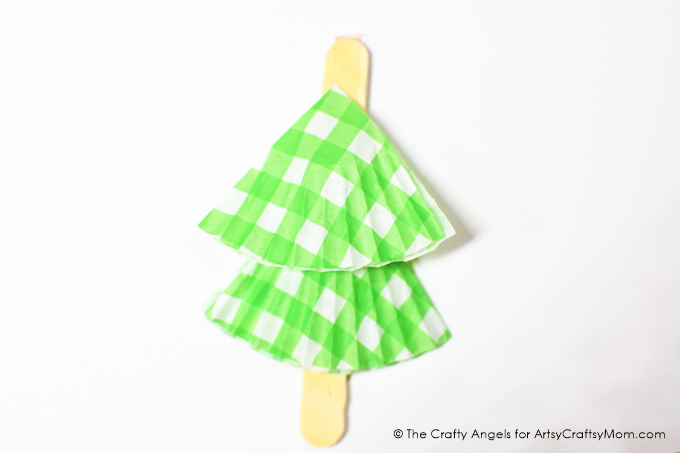 Finished putting the final touches on your tree? If not, then here's a Cute DIY Cupcake Liner Tree Christmas Ornament to add that perfect handmade touch!