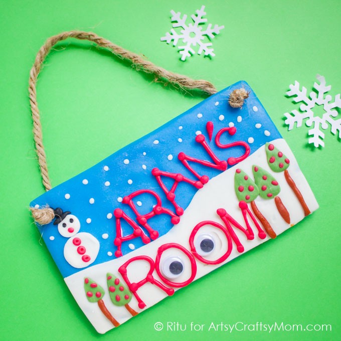 Personalize your child's room with a winter themed kid-made Clay Nameplate, made with homemade porcelain clay. Really easy to make and great to gift too!