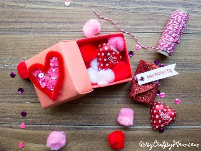 This DIY Origami Gift Box is perfect for Valentine's Day! Fill it with small gifts, candy and a cute message straight from the heart!