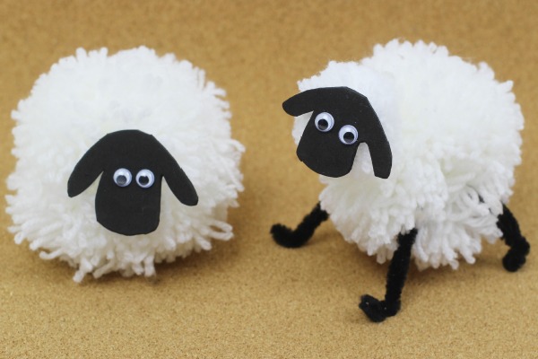 Crafty kids will love spinning yarn with these fuzzy pom pom craft projects