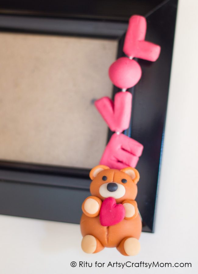 Nothing spells love like a cute little teddy bear holding a heart! Make this Valentine's Day Clay Teddy Bear for a special someone - they'll love it!