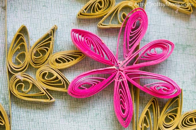 Infuse the essence of spring in your home with a Flower Garden Paper Quilling Wall Art! With flowers, butterflies & lady bugs, this sure is a pretty garden! 