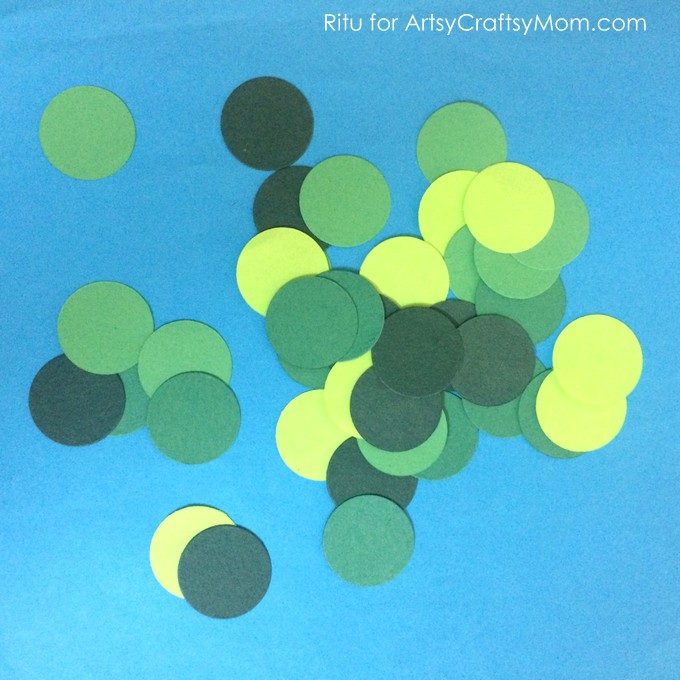 Collages are a popular art form - from artists to toddlers! Try out this spring themed Circle Punch Paper Collage - with just craft paper & a circle punch!