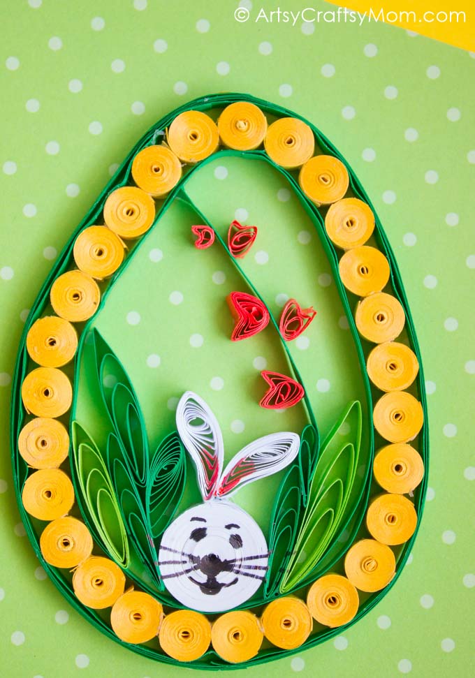 This Quilled Easter Egg Craft includes all iconic elements of Easter: a bunny, the Easter egg and spring flowers! Perfect as wall art or on a greeting card!