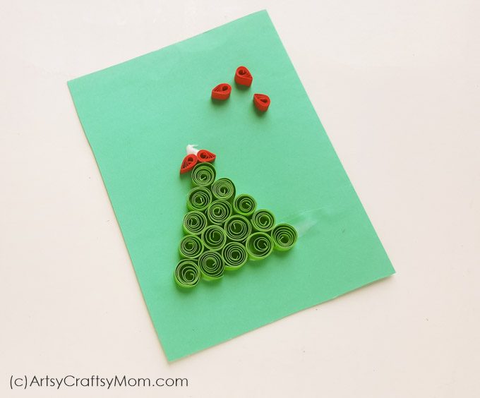 Make this cute little DIY Paper Quilling Christmas Tree Ornament to add some color & charm to your big tree! Also looks great on a handmade Christmas card!