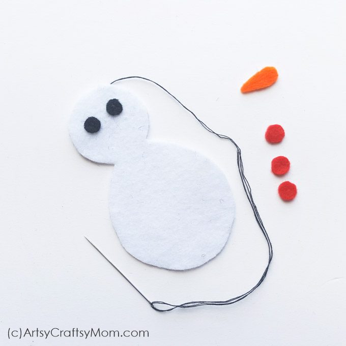 This Felt Snowman Christmas Ornament can brighten up any Christmas tree or mantle!! With our free printable template, this is perfect for sewing beginners!