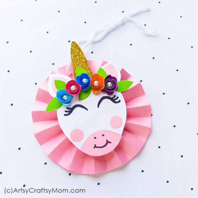 Make your Christmas tree even more magical with a DIY Unicorn Paper Ornament!! With craft paper, beads and glitter, this craft is a breeze to make!