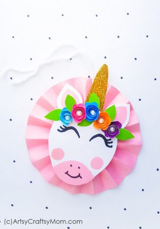 Make your Christmas tree even more magical with a DIY Unicorn Paper Ornament!! With craft paper, beads and glitter, this craft is a breeze to make!