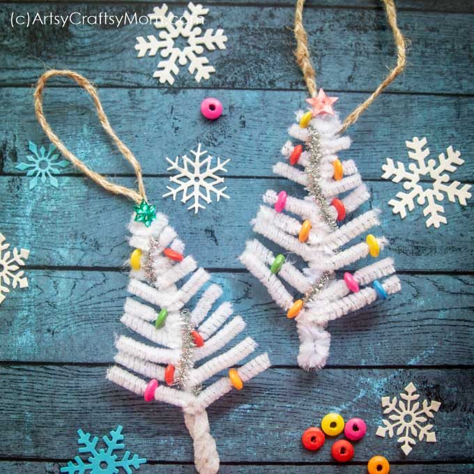 Dreaming of a white Christmas? Make it come true with our White Pipe cleaner Christmas Tree Ornament Craft! Super easy to make with just a few supplies!