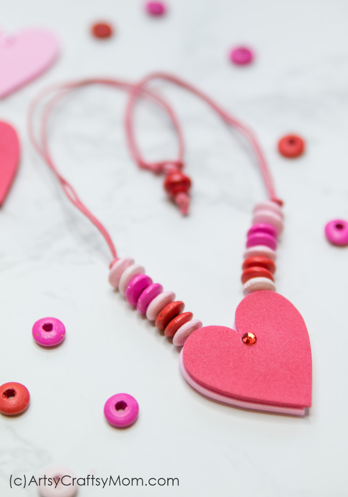 This DIY Reversible Valentine Heart Necklace makes a great gift for a classroom Valentine! A quick and easy craft that can be made in just a few minutes!