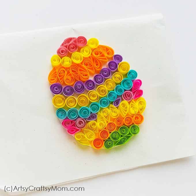 Colorful Easter eggs are the most identifying feature of this holiday! Make your own with this easy and bright Paper Quilling Easter Egg Craft!