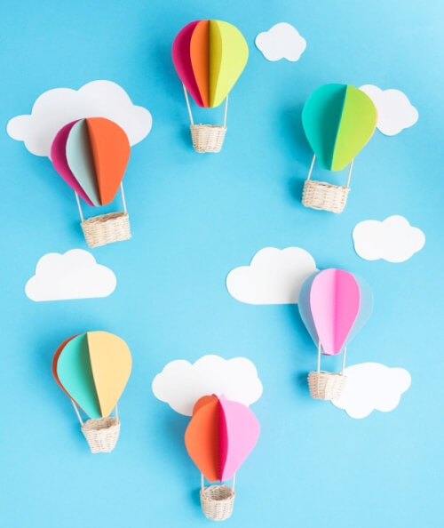 Get ready to soar into the big blue sky with these cute Hot Air Balloon Crafts for Kids! Make hot air balloons out of paper, buttons, Washi tape and more!