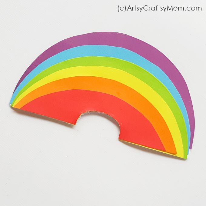 A rainbow can brighten up anyone's day, especially when it's as cheerful as this smiling rainbow paper craft! Use this to instantly perk up any space!