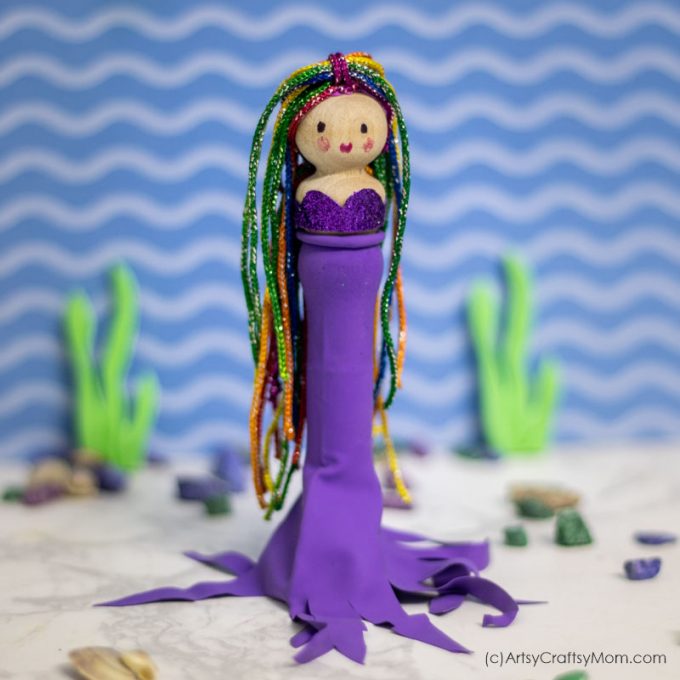 You don't need too many things to make this gorgeous Peg Doll Mermaid Craft! Dress up her in any color of your choice & get ready for lots of pretend play!