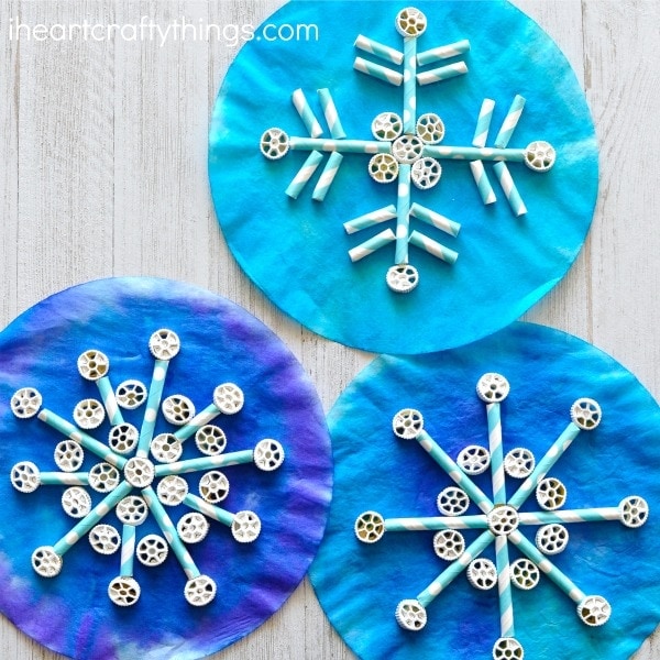 Celebrate winter with these stunning snowflake crafts for kids! Each one is more beautiful than the next, and there's something for all ages!