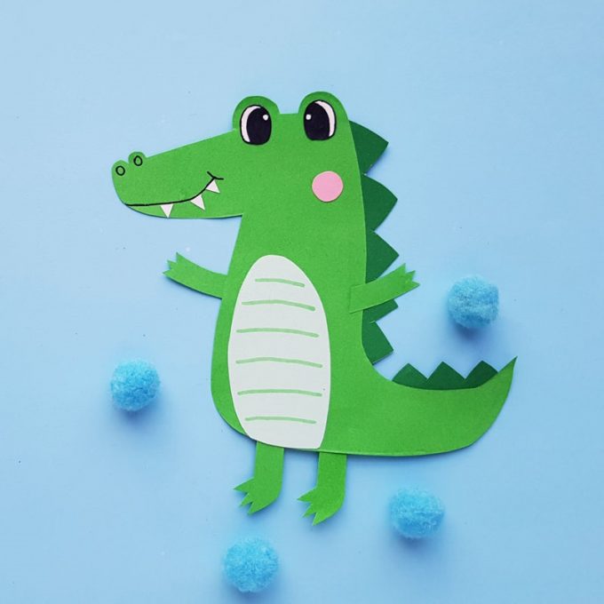 Paper Alligator Craft for kids that is perfect for A for alligator alphabet study, learning about reptiles or as a puppet! Includes a free template!