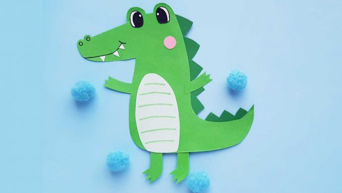 Paper Alligator Craft for kids that is perfect for A for alligator alphabet study, learning about reptiles or as a puppet! Includes a free template!