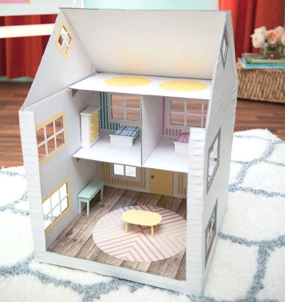 Check out these DIY Dollhouse Ideas for Kids to Make themselves! Few things are as satisfying to make as a dollhouse, especially when you decorate it yourself! 