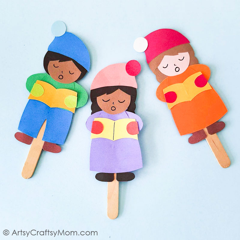 Popsicle Stick Christmas Carolers Craft 11 This Super Cute Popsicle Stick Christmas Carolers Craft is sure to bring a smile to your face! Use it as a bookmark, ornament or gift tag!