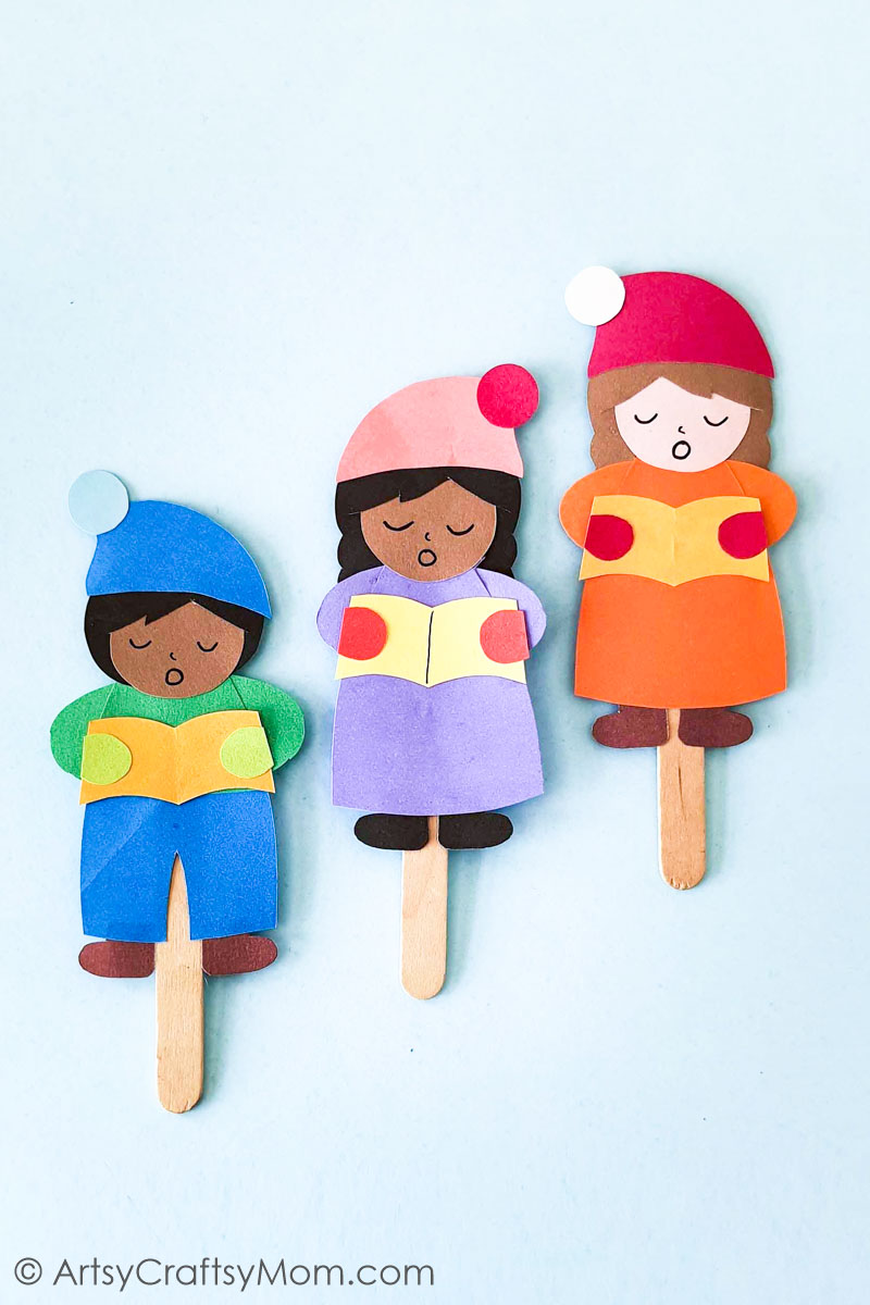 Popsicle Stick Christmas Carolers Craft 12 This Super Cute Popsicle Stick Christmas Carolers Craft is sure to bring a smile to your face! Use it as a bookmark, ornament or gift tag!