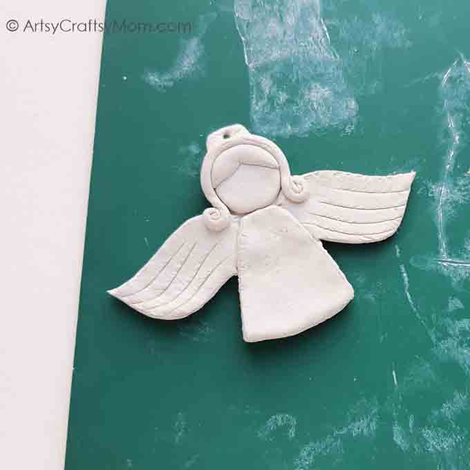 This Beautiful DIY Clay Angel Ornament is a lovely addition to your Christmas tree! Also great as a gift tag, stocking stuffer or Secret Santa gift!