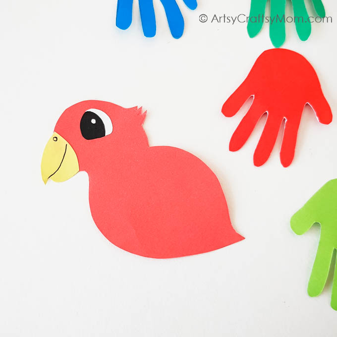 Here's a colorful handprint parrot craft to brighten up your day! Perfect for young kids to use their hands and learn about different colors!