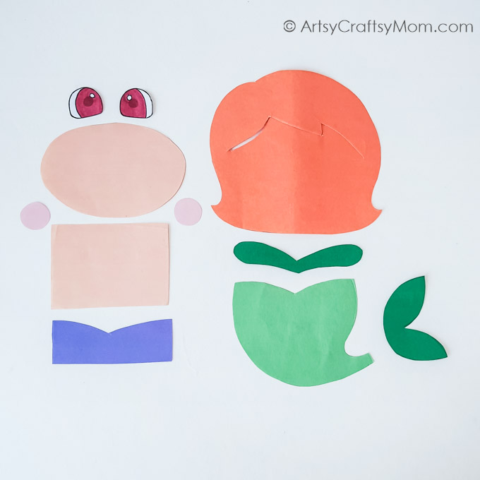 How cute is this paper bag mermaid puppet? It's the perfect craft for mermaid fans and goes well with a reading of 'The Little Mermaid'!