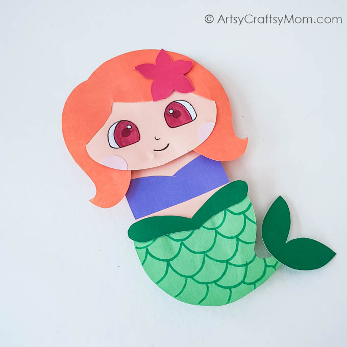 How cute is this paper bag mermaid puppet? It's the perfect craft for mermaid fans and goes well with a reading of 'The Little Mermaid'!