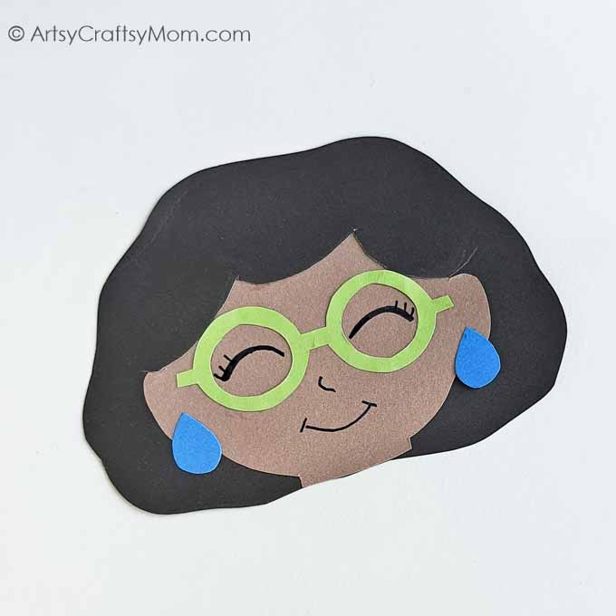 Encanto fans will love this adorable Paper Bag Mirabel Craft! Just download, print and follow the instructions to make this easy peasy project!