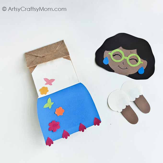 Encanto fans will love this adorable Paper Bag Mirabel Craft! Just download, print and follow the instructions to make this easy peasy project!