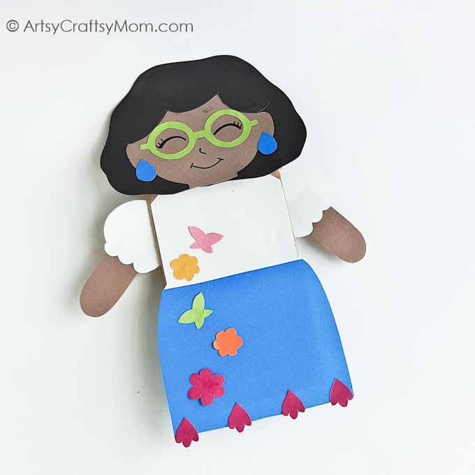 Encanto fans will love this adorable Paper Bag Mirabel Craft! Just download, print and follow the instructions to make this easy peasy project!