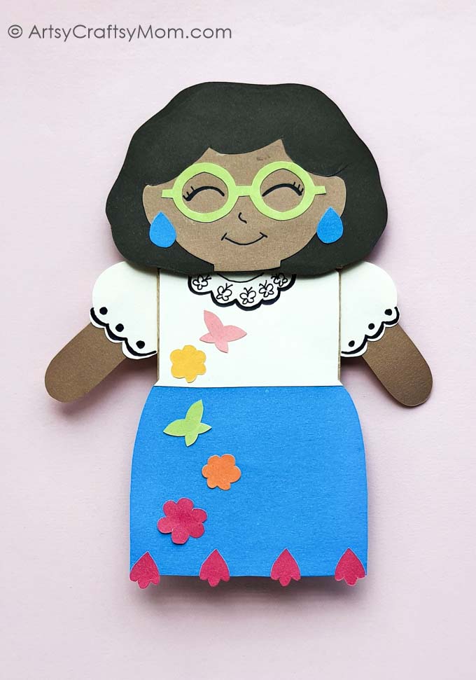 Encanto fans will love this adorable Paper Bag Mirabel Craft! Just download, print and follow the instructions to make this easy peasy project!