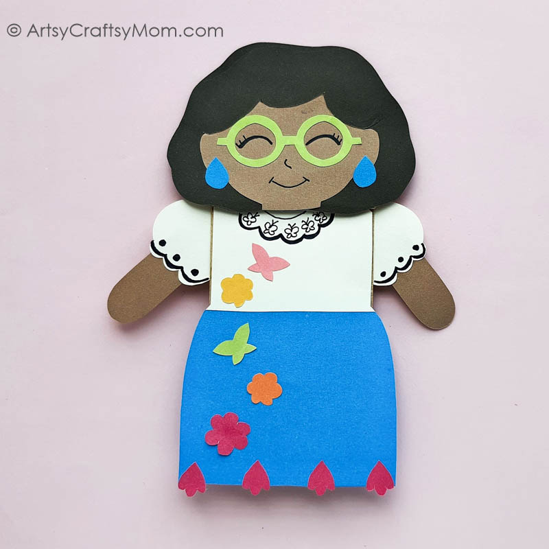 Encanto fans will love this adorable Paper Bag Mirabel Craft! Just download, print and follow the instructions to make this easy peasy project!
