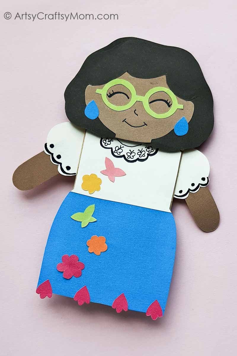 Encanto fans will love this adorable Paper Bag Mirabel Craft! Just download, print and follow the instructions to make this easy peasy project!