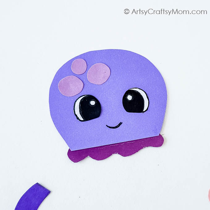 Cute and Easy DIY Paper Octopus Bookmark for Kids 5 Here's a cute little paper octopus bookmark that'll prove to be a cheerful and appropriate companion for your little one's summer reading!