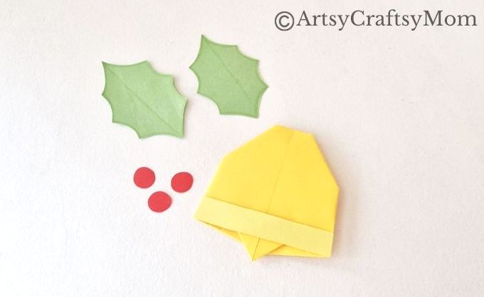This Christmas Origami Bell Craft is an easy project for kids to try this holiday season and don't worry about the mess - all you need is paper!