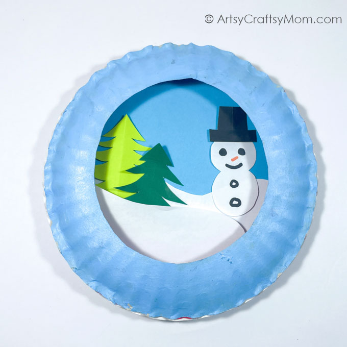This Paper Plate Snow Globe Craft is a lovely representation of a snowy winter - and proof that you can make a snow globe from paper plates!