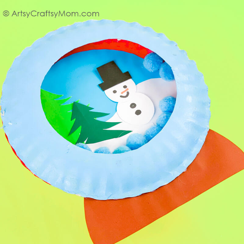 This Paper Plate Snow Globe Craft is a lovely representation of a snowy winter - and proof that you can make a snow globe from paper plates!