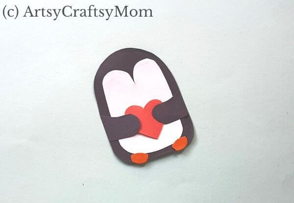 Adorable Penguin Heart Bookmark Craft 9 Here's an adorable penguin heart bookmark that's perfect for the festive season! Now you have a cute li'l book buddy for all your holiday reading!