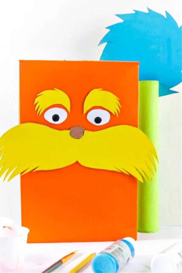 With Dr. Seuss' birthday coming up, it's a great time to make these Lorax crafts for kids! All you need are regular craft supplies and you're all set!