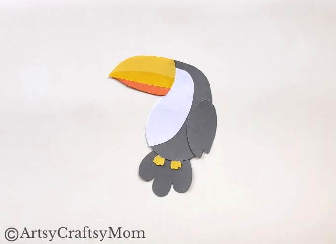 Here's a fun and easy toucan bookmark craft for kids of all ages to try! All you need are basic supplies like craft papers, scissors, glue & Sharpies!