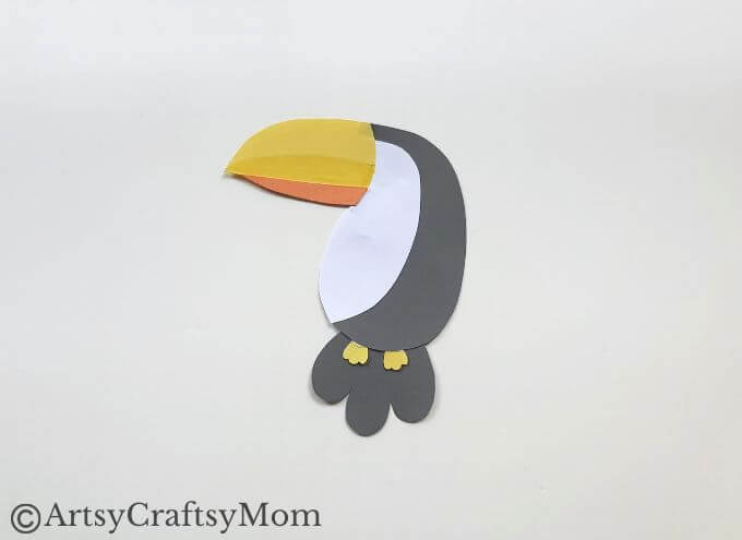 Here's a fun and easy toucan bookmark craft for kids of all ages to try! All you need are basic supplies like craft papers, scissors, glue & Sharpies!